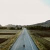 Person standing on road keep distance from everyone