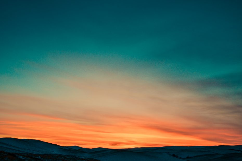 Sunset over snow covered mountains I hate dusk